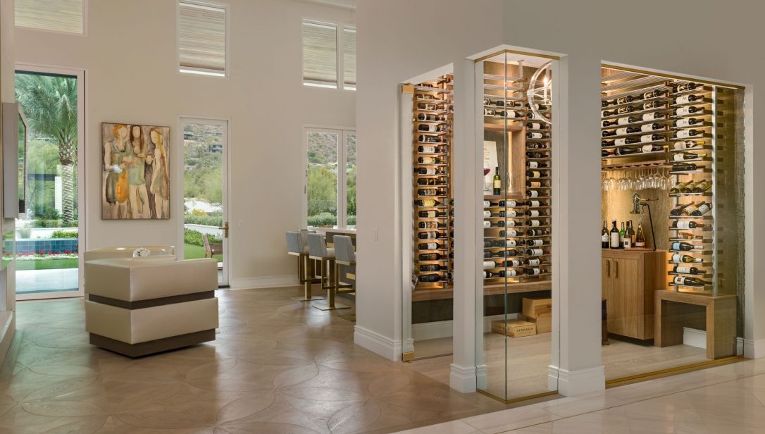 Modern wine cellar with glass doors on display in a luxury home