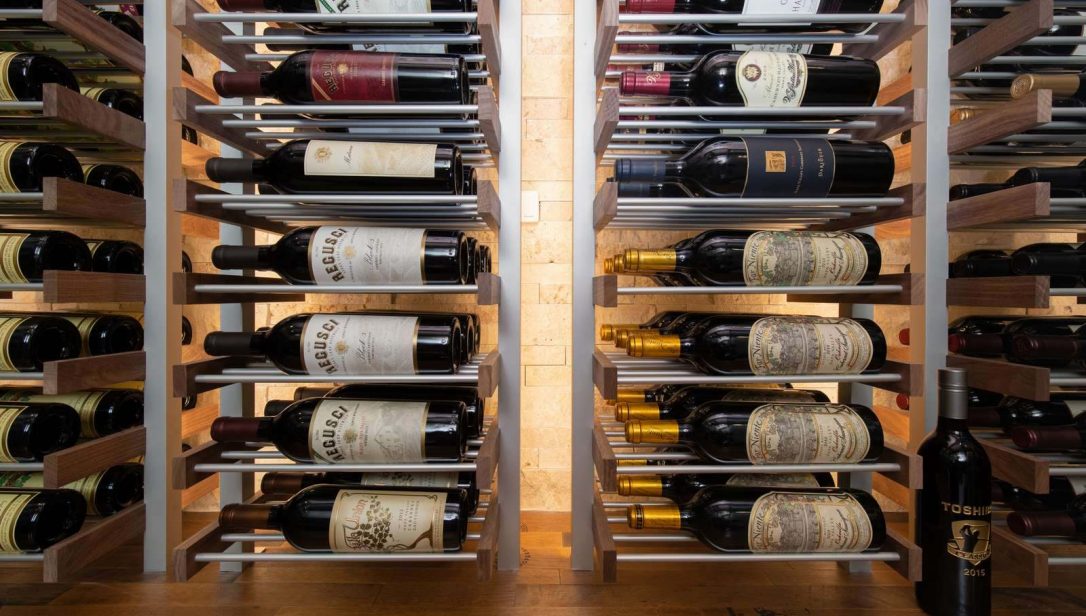 Wine collection displayed in a traditional wine cellar
