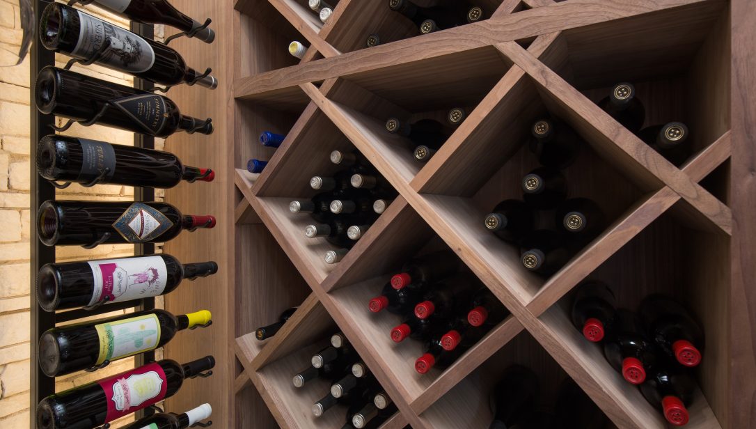 Wine cellar wall sectioned by timber