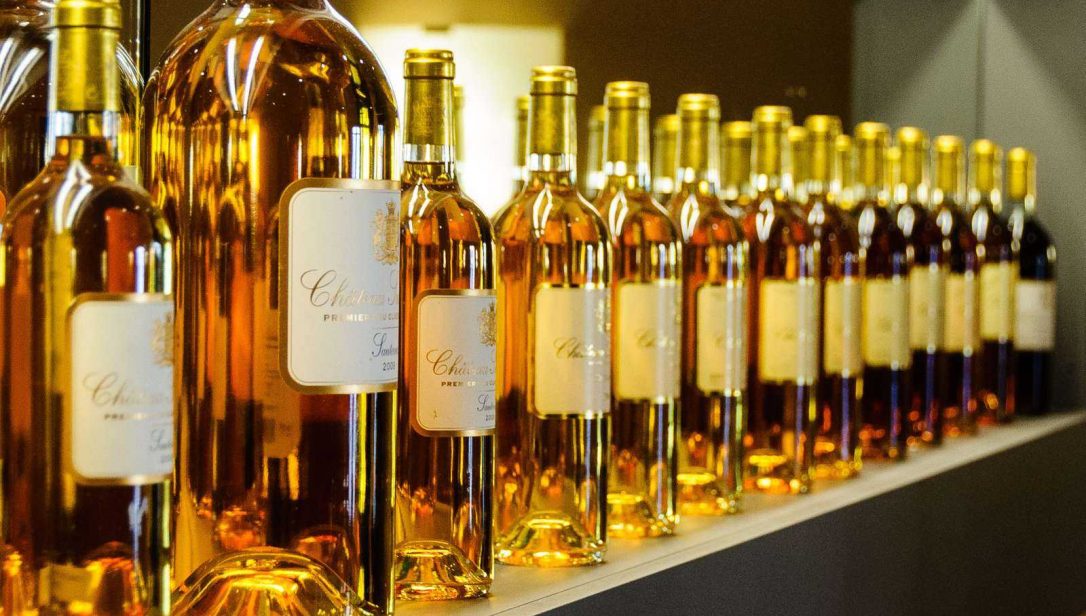different size wine bottles lined up