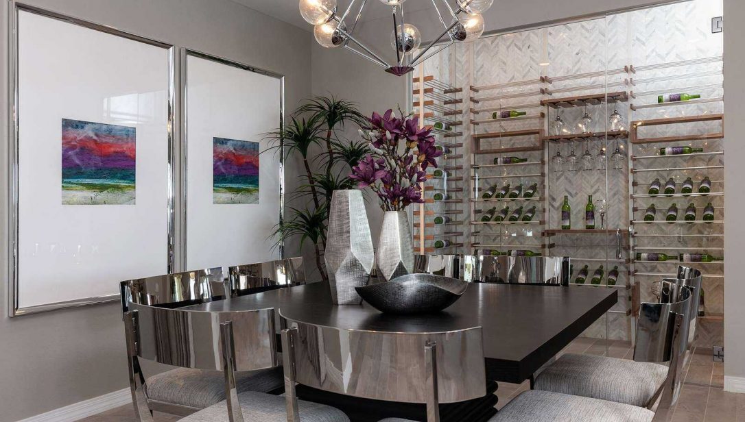 Modern built in wine cellar behind table