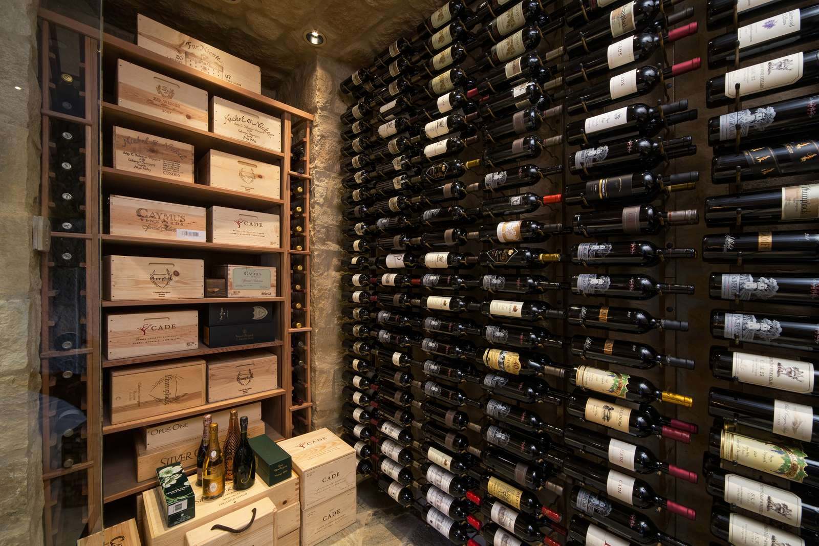 Interior of a traditional wine cellar stacked with wine