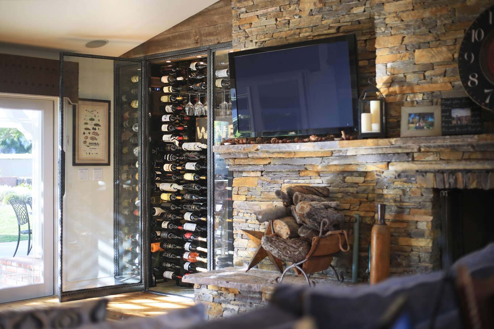 Rustic styled glass enclosed wine wall