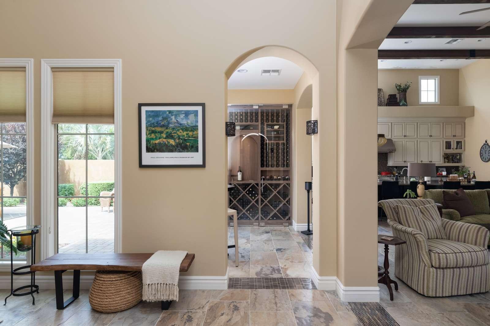 View through high end residential home to traditional wine cellar