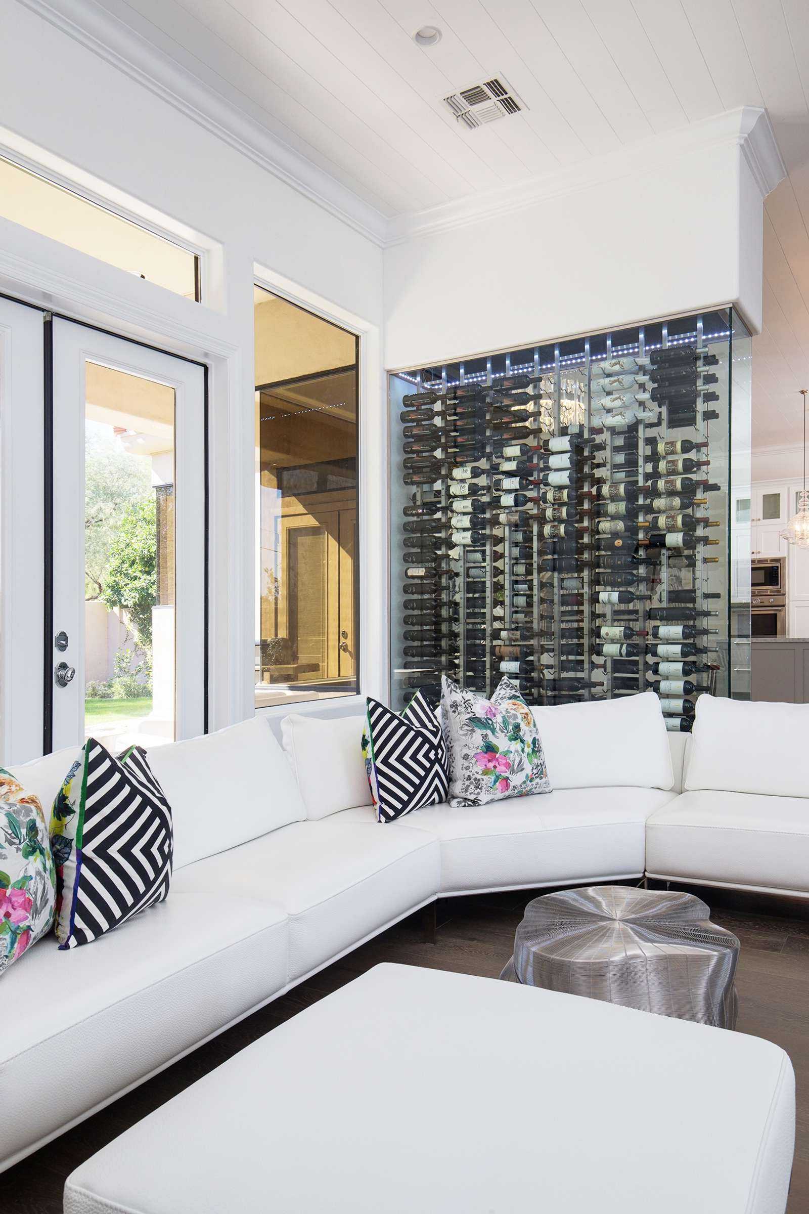 glass wine wall divide in modern home