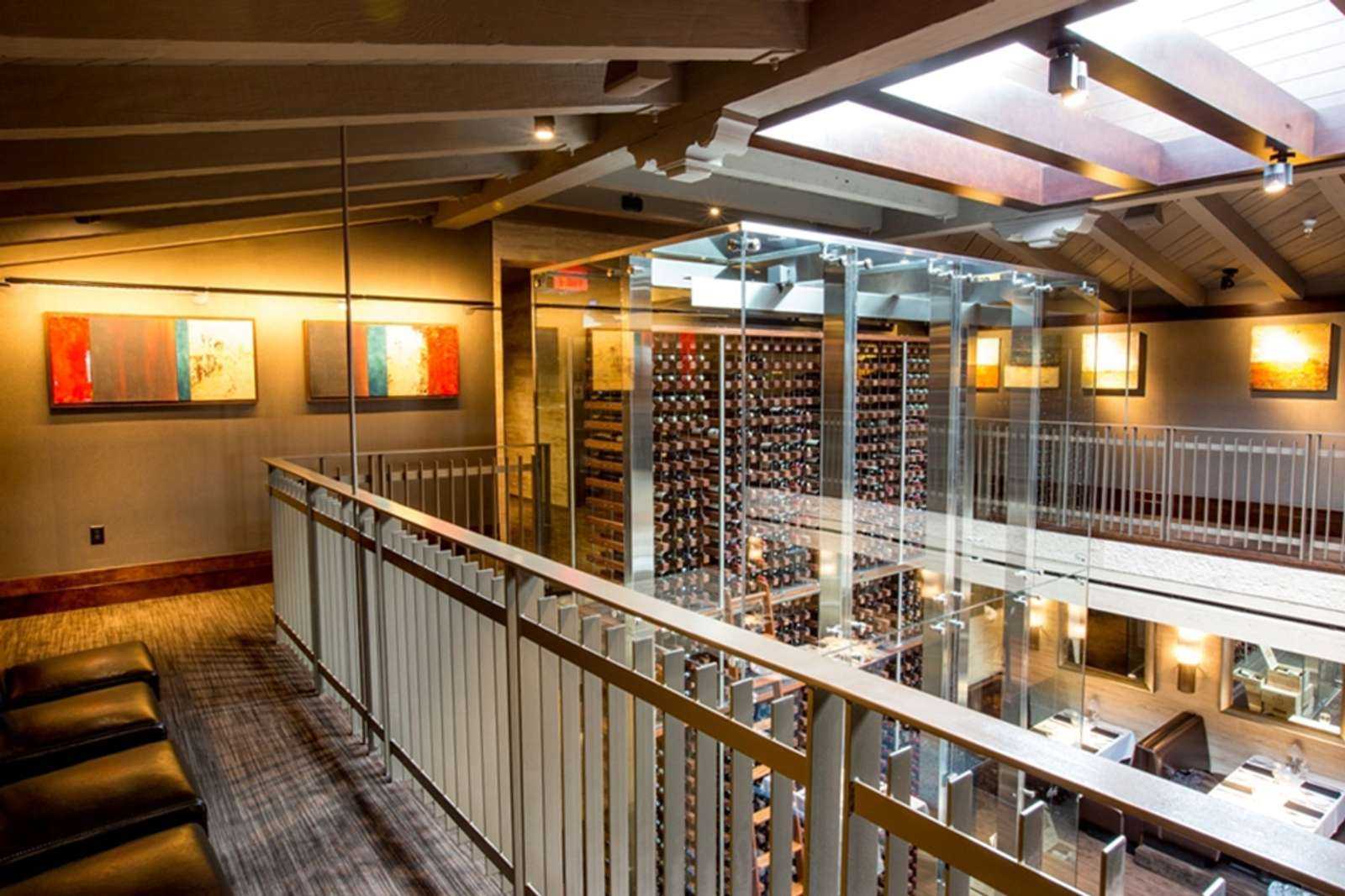 glass wine wall in Eddie V's restaurant San Diego