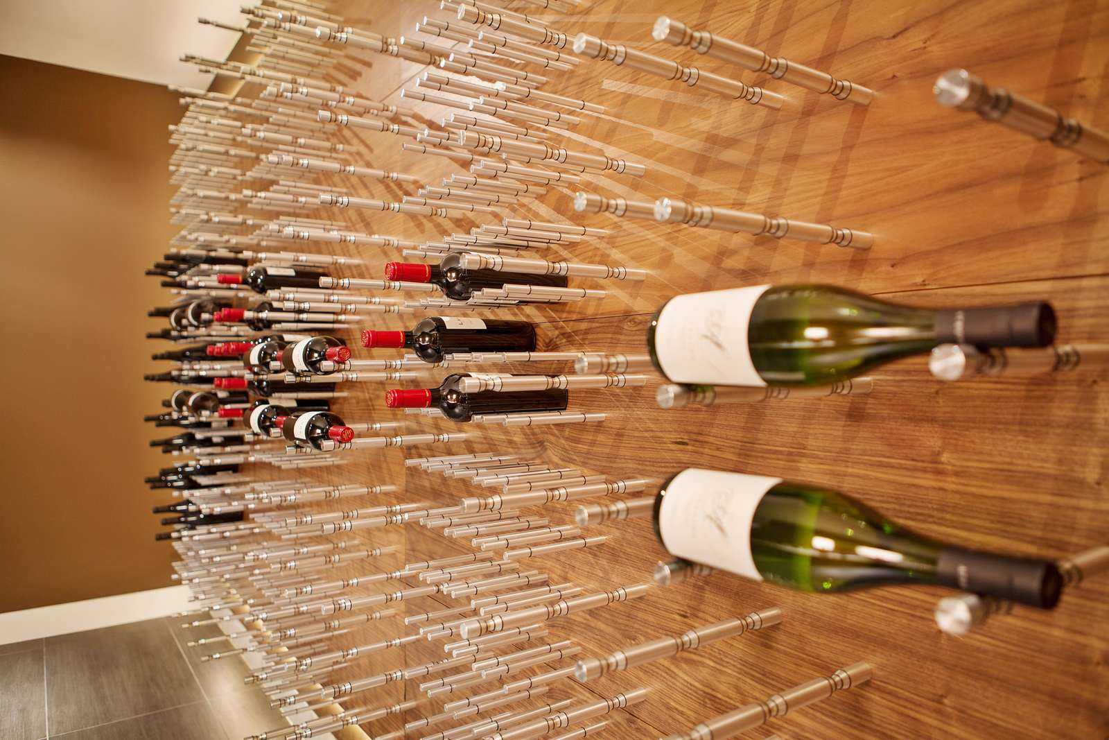 metal wine racking in modern wine cellar
