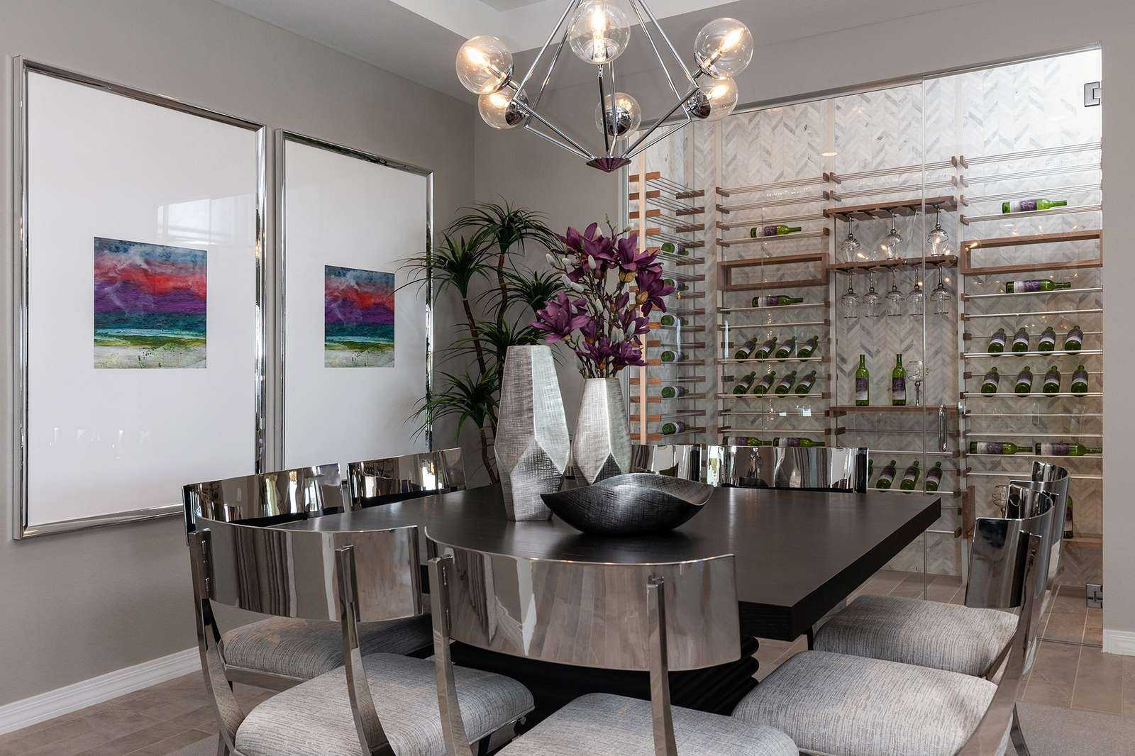 modern built in wine cellar behind table